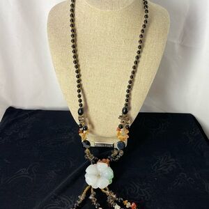 Chic Black and Gold Beaded Necklace with Floral Charm